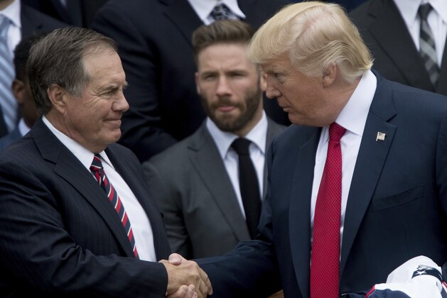 President Donald Trump shakes hands with New England Patriots head coach Bill Belichick during a ceremony on the South Lawn of the White House in Washington, Wednesday, April 19, 2017, where the president honored the Super Bowl Champion New England Patriots for their Super Bowl LI victory. Also pictured is New England Patriots wide receiver Julian Edelman, center. (AP Photo/Andrew Harnik)