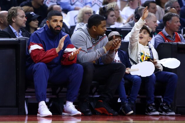 TORONTO, ON - MAY 03:  Drake looks on from his court side seat in the first half of Game Two of the Eastern Conference Semifinals between the Cleveland Cavaliers and the Toronto Raptors during the 2018 NBA Playoffs at Air Canada Centre on May 3, 2018 in Toronto, Canada.  NOTE TO USER: User expressly acknowledges and agrees that, by downloading and or using this photograph, User is consenting to the terms and conditions of the Getty Images License Agreement.  (Photo by Vaughn Ridley/Getty Images)