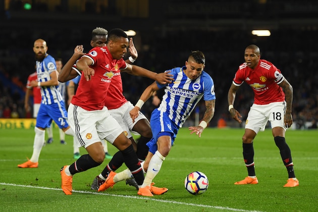 BRIGHTON, ENGLAND - MAY 04:  Anthony Knockaert of Brighton & Hove Albion goes down in the box as he is challenged by Anthony Martial of Manchester United during the Premier League match between Brighton and Hove Albion and Manchester United at Amex Stadium on May 4, 2018 in Brighton, England.  (Photo by Mike Hewitt/Getty Images)