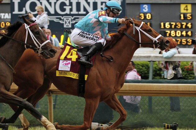 Florent Geroux rides Monomoy Girl to victory during the 144th running of the Kentucky Oaks horse race at Churchill Downs Friday, May 4, 2018, in Louisville, Ky. (AP Photo/Garry Jones)