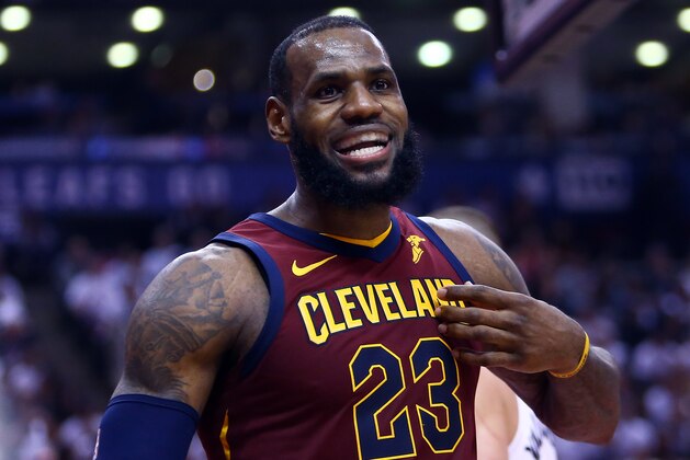 TORONTO, ON - MAY 03:  LeBron James #23 of the Cleveland Cavaliers reacts in the second half of Game Two of the Eastern Conference Semifinals against the Toronto Raptors during the 2018 NBA Playoffs at Air Canada Centre on May 3, 2018 in Toronto, Canada.  NOTE TO USER: User expressly acknowledges and agrees that, by downloading and or using this photograph, User is consenting to the terms and conditions of the Getty Images License Agreement.  (Photo by Vaughn Ridley/Getty Images)