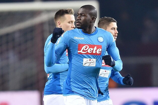 Napoli defender Kalidou Koulibaly celebrates after scoring his side's first goal during the Italian Serie A soccer match between Torino and Napoli at Olympic stadium in Turin, Italy, Saturday, Dec. 16, 2017. (Alessandro Di Marco/ANSA via AP)