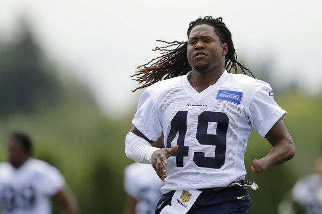 Seattle Seahawks linebacker Shaquem Griffin takes part in a drill Friday, May 4, 2018, during NFL rookie football camp in Renton, Wash. (AP Photo/Ted S. Warren)
