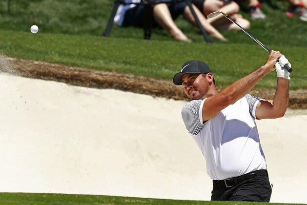 Jason Day, of Australia, hits from a sand trap on the first hole during the second round of the Wells Fargo Championship golf tournament at Quail Hollow Club in Charlotte, N.C., Friday, May 4, 2018. (AP Photo/Jason E. Miczek)