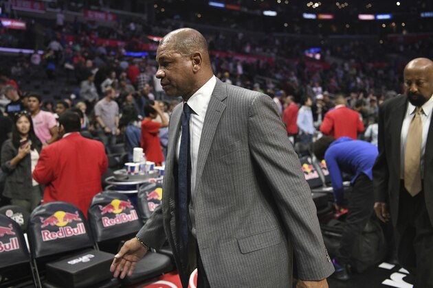 Los Angeles Clippers head coach Doc Rivers walks off the court after their loss to the Denver Nuggets after an NBA basketball game Saturday, April 7, 2018, in Los Angeles. (AP Photo/Michael Owen Baker)