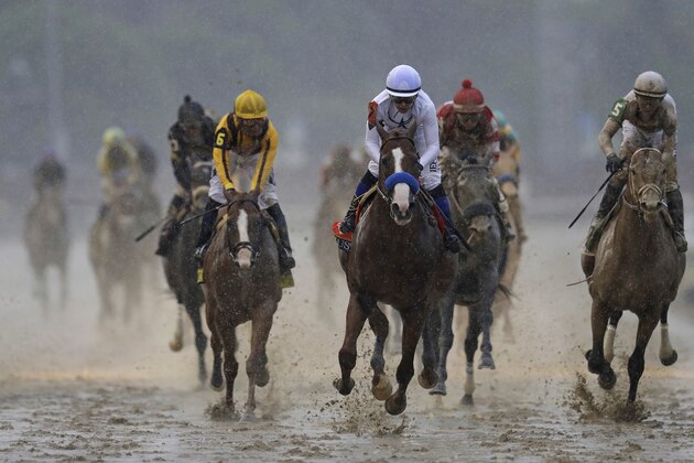 Mike Smith rides Justify to victory during the 144th running of the Kentucky Derby horse race at Churchill Downs Saturday, May 5, 2018, in Louisville, Ky. (AP Photo/Darron Cummings)