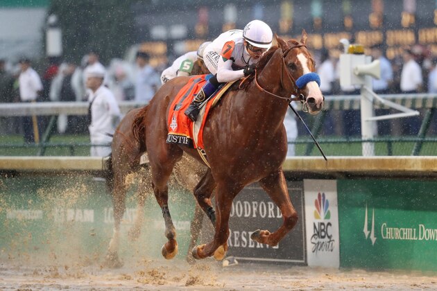 LOUISVILLE, KY - MAY 05:  Justify #7, ridden by jockey Mike Smith crosses the finish line to win the 144th running of the Kentucky Derby at Churchill Downs on May 5, 2018 in Louisville, Kentucky.  (Photo by Rob Carr/Getty Images)