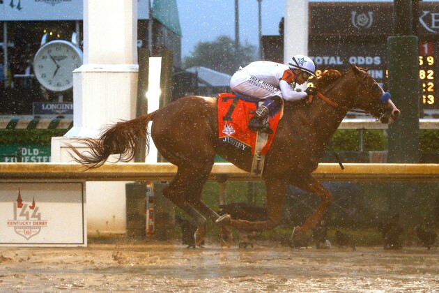 LOUISVILLE, KY - MAY 05:  Justify #7, ridden by jockey Mike Smith crosses the finish line to win the 144th running of the Kentucky Derby at Churchill Downs on May 5, 2018 in Louisville, Kentucky.  (Photo by Michael Reaves/Getty Images)