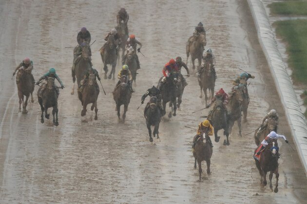 LOUISVILLE, KY - MAY 05:  Justify #7, ridden by jockey Mike Smith leads the field to the finish line to win the 144th running of the Kentucky Derby at Churchill Downs on May 5, 2018 in Louisville, Kentucky.  (Photo by Jamie Squire/Getty Images)