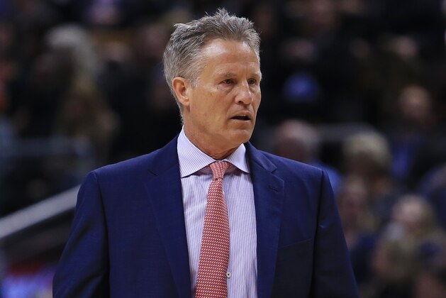 TORONTO, ON - APRIL 12:  Head Coach Brett Brown of the  Philadelphia 76ers looks on during the first half of an NBA game against the Toronto Raptors at the Air Canada Centre on April 12, 2016 in Toronto, Ontario, Canada.  NOTE TO USER: User expressly acknowledges and agrees that, by downloading and or using this photograph, User is consenting to the terms and conditions of the Getty Images License Agreement.  (Photo by Vaughn Ridley/Getty Images)