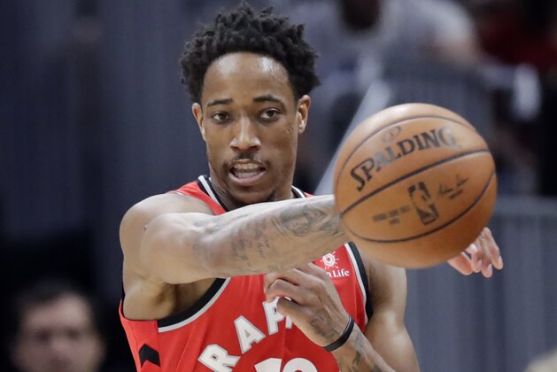 Toronto Raptors' DeMar DeRozan passes the ball during the first half against the Cleveland Cavaliers in Game 3 of an NBA basketball second-round playoff series Saturday, May 5, 2018, in Cleveland. (AP Photo/Tony Dejak)