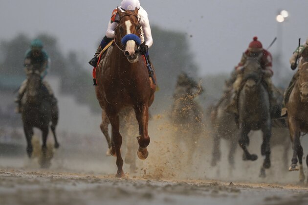 Mike Smith rides Justify to victory during the 144th running of the Kentucky Derby horse race at Churchill Downs Saturday, May 5, 2018, in Louisville, Ky. (AP Photo/Morry Gash)