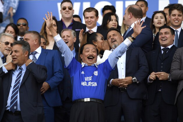 CARDIFF, WALES - MAY 06:  Vincent Tan, Cardiff City owner celebrates his team gaining promotion to the premier leauge after the Sky Bet Championship match between Cardiff City and Reading at Cardiff City Stadium on May 6, 2018 in Cardiff, Wales.  (Photo by Stu Forster/Getty Images)