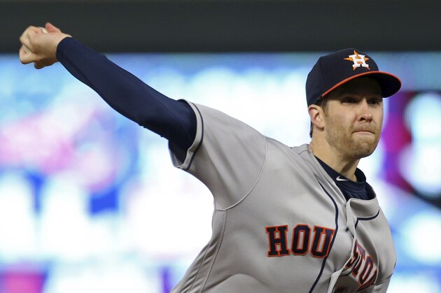 Houston Astros pitcher Collin McHugh plays against the Minnesota Twins in the first inning of a baseball game Tuesday, April 10, 2018, in Minneapolis. (AP Photo/Jim Mone)