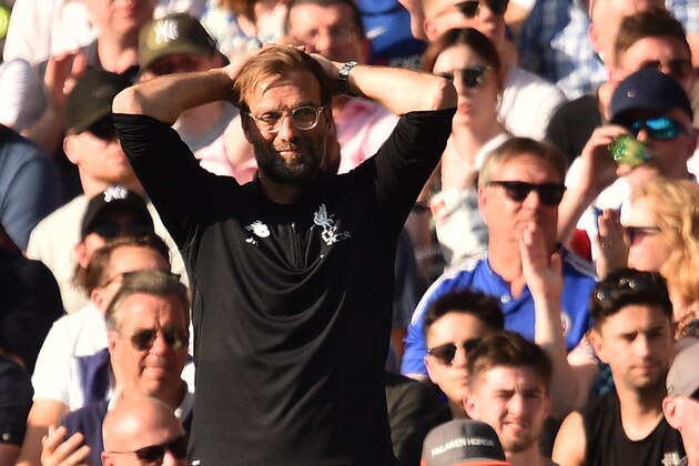 Liverpool's German manager Jurgen Klopp looks on during the English Premier League football match between Chelsea and Liverpool at Stamford Bridge in London on May 6, 2018. (Photo by Glyn KIRK / AFP) / RESTRICTED TO EDITORIAL USE. No use with unauthorized audio, video, data, fixture lists, club/league logos or 'live' services. Online in-match use limited to 75 images, no video emulation. No use in betting, games or single club/league/player publications. /         (Photo credit should read GLYN KIRK/AFP/Getty Images)