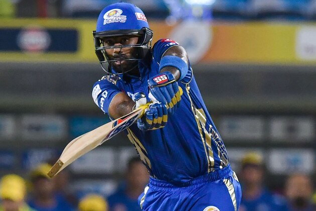 Mumbai Indians cricketer Suryakumar Yadav plays a shot during the 2018 Indian Premier League (IPL) Twenty20 cricket match between Chennai Super Kings and Mumbai Indians at the Maharashtra Cricket Association International Stadium in Mumbai on April 28, 2018. (Photo by INDRANIL MUKHERJEE / AFP)        (Photo credit should read INDRANIL MUKHERJEE/AFP/Getty Images)