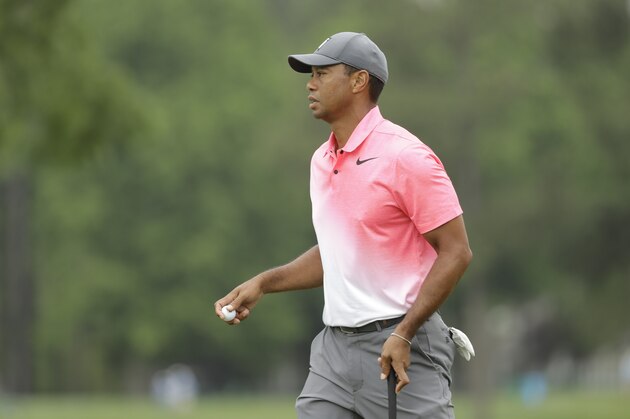 Tiger Woods reacts to his birdie on the fifth hole during the third round of the Wells Fargo Championship golf tournament at Quail Hollow Club in Charlotte, N.C., Saturday, May 5, 2018. (AP Photo/Chuck Burton)