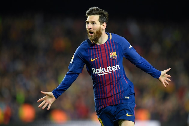Barcelona's Argentinian forward Lionel Messi celebrates after scoring a goal during the Spanish league football match between FC Barcelona and Real Madrid CF at the Camp Nou stadium in Barcelona on May 6, 2018. (Photo by LLUIS GENE / AFP)        (Photo credit should read LLUIS GENE/AFP/Getty Images)