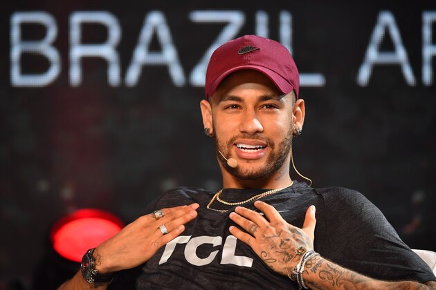 TOPSHOT - Brazilian PSG's footballer Neymar Junior takes part in a promotional event of the Chinese consumer electronic brand TCL for the media, in Sao Paulo, Brazil, on April 17, 2018. - Brazilian superstar Neymar said Tuesday that he won't be back playing at least until the second half of May, when he is scheduled to have his final medical exam following foot surgery. (Photo by Nelson ALMEIDA / AFP)        (Photo credit should read NELSON ALMEIDA/AFP/Getty Images)