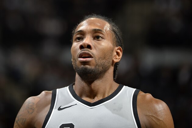 SAN ANTONIO, TX - JANUARY 13:  Kawhi Leonard #2 of the San Antonio Spurs looks on during the game against the Denver Nuggets on January 13, 2018 at the AT&T Center in San Antonio, Texas. NOTE TO USER: User expressly acknowledges and agrees that, by downloading and or using this photograph, user is consenting to the terms and conditions of the Getty Images License Agreement. Mandatory Copyright Notice: Copyright 2018 NBAE (Photos by Mark Sobhani/NBAE via Getty Images)