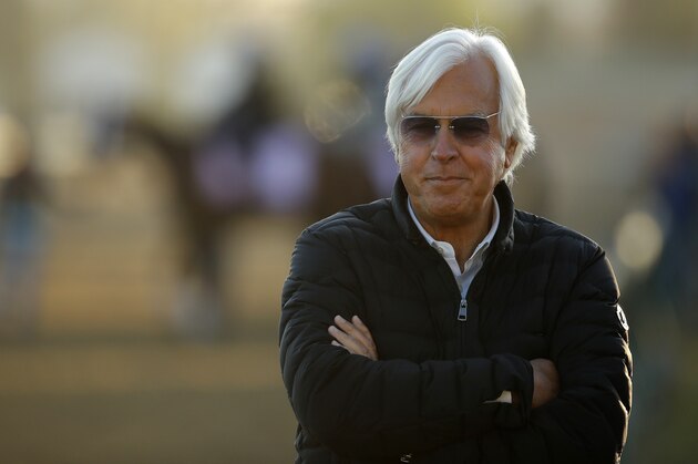 Trainer Bob Baffert watches a morning workout at Churchill Downs Tuesday, May 1, 2018, in Louisville, Ky. The 144th running of the Kentucky Derby is scheduled for Saturday, May 5. (AP Photo/Charlie Riedel)