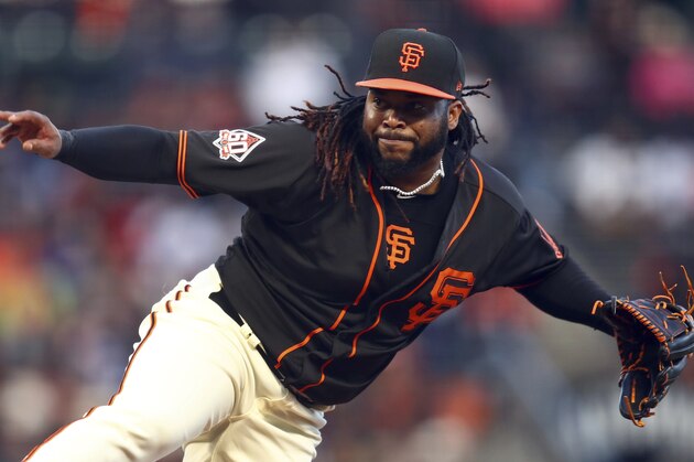 San Francisco Giants pitcher Johnny Cueto works against the Los Angeles Dodgers in the first inning of the second game of a baseball doubleheader Saturday, April 28, 2018, in San Francisco. (AP Photo/Ben Margot)