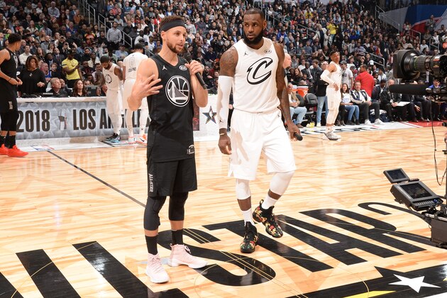 LOS ANGELES, CA - FEBRUARY 18: Stephen Curry #30 and LeBron James #23 speak to the crowd during the NBA All-Star Game as a part of 2018 NBA All-Star Weekend at STAPLES Center on February 18, 2018 in Los Angeles, California. NOTE TO USER: User expressly acknowledges and agrees that, by downloading and/or using this photograph, user is consenting to the terms and conditions of the Getty Images License Agreement.  Mandatory Copyright Notice: Copyright 2018 NBAE (Photo by Andrew D. Bernstein/NBAE via Getty Images)