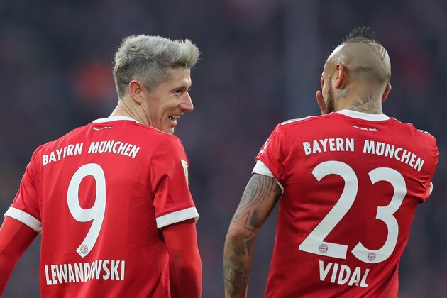 MUNICH, GERMANY - DECEMBER 02: Arturo Vidal of FC Bayern Muenchen celebrates with team mate Robert Lewandowski after scoring his team's first goal during the Bundesliga match between FC Bayern Muenchen and Hannover 96 at Allianz Arena on December 2, 2017 in Munich, Germany. (Photo by Boris Streubel/Getty Images) MUNICH, GERMANY - DECEMBER 02: Arturo Vidal of FC Bayern Muenchen celebrates with team mate Robert Lewandowski after scoring his team's first goal during the Bundesliga match between FC Bayern Muenchen and Hannover 96 at Allianz Arena on December 2, 2017 in Munich, Germany. (Photo by Boris Streubel/Getty Images)