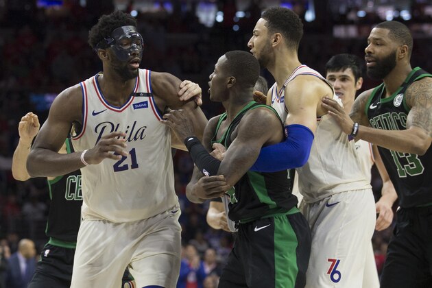 PHILADELPHIA, PA - MAY 7: Joel Embiid #21 of the Philadelphia 76ers gets into an altercation with Terry Rozier #12 of the Boston Celtics as Jayson Tatum #0 and Marcus Morris #13 of the Boston Celtics and Ben Simmons #25 of the Philadelphia 76ers try to break them up in the second quarter during Game Four of the Eastern Conference Second Round of the 2018 NBA Playoffs at Wells Fargo Center on May 7, 2018 in Philadelphia, Pennsylvania. NOTE TO USER: User expressly acknowledges and agrees that, by downloading and or using this photograph, User is consenting to the terms and conditions of the Getty Images License Agreement. (Photo by Mitchell Leff/Getty Images)