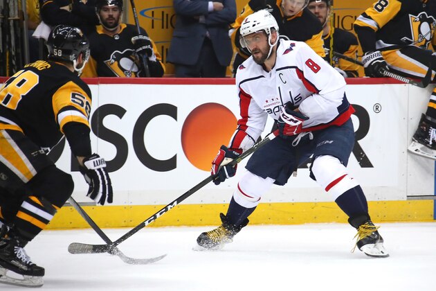 PITTSBURGH, PA - MAY 07:  Alex Ovechkin #8 of the Washington Capitals looks to get around the stick of Kris Letang #58 of the Pittsburgh Penguins during the first period in Game Six of the Eastern Conference Second Round during the 2018 NHL Stanley Cup Playoffs at PPG Paints Arena on May 7, 2018 in Pittsburgh, Pennsylvania.  (Photo by Gregory Shamus/Getty Images)
