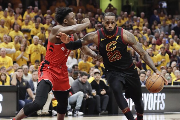 Cleveland Cavaliers' LeBron James (23) drives on Toronto Raptors' OG Anunoby (3), from England, in the first half of Game 4 of an NBA basketball second-round playoff series, Monday, May 7, 2018, in Cleveland. (AP Photo/Tony Dejak)