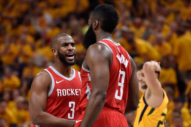 SALT LAKE CITY, UT - MAY 06: Chris Paul #3 of the Houston Rockets talks with teammate James Harden #13 after Harden was fouled shooting a basket in the second half during Game Four of Round Two of the 2018 NBA Playoffs against the Utah Jazz at Vivint Smart Home Arena on May 6, 2018 in Salt Lake City, Utah. The Rockets beat the Jazz 100-87. NOTE TO USER: User expressly acknowledges and agrees that, by downloading and or using this photograph, User is consenting to the terms and conditions of the Getty Images License Agreement. (Photo by Gene Sweeney Jr./Getty Images)