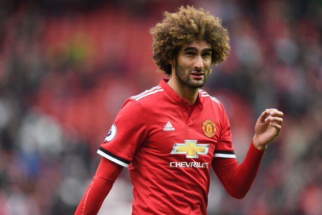 Manchester United's Belgian midfielder Marouane Fellaini leaves the pitch after the English Premier League football match between Manchester United and Arsenal at Old Trafford in Manchester, north west England, on April 29, 2018. - Manchester United won the game 2-1. (Photo by Paul ELLIS / AFP) / RESTRICTED TO EDITORIAL USE. No use with unauthorized audio, video, data, fixture lists, club/league logos or 'live' services. Online in-match use limited to 75 images, no video emulation. No use in betting, games or single club/league/player publications. / (Photo credit should read PAUL ELLIS/AFP/Getty Images) Manchester United's Belgian midfielder Marouane Fellaini leaves the pitch after the English Premier League football match between Manchester United and Arsenal at Old Trafford in Manchester, north west England, on April 29, 2018. - Manchester United won the game 2-1. (Photo by Paul ELLIS / AFP) / RESTRICTED TO EDITORIAL USE. No use with unauthorized audio, video, data, fixture lists, club/league logos or 'live' services. Online in-match use limited to 75 images, no video emulation. No use in betting, games or single club/league/player publications. / (Photo credit should read PAUL ELLIS/AFP/Getty Images)