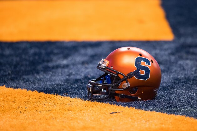 SYRACUSE, NY - SEPTEMBER 09:  A Syracuse Orange football helmet on the field before the game against the Louisville Cardinals on September 9, 2016 at The Carrier Dome in Syracuse, New York.  Louisville defeats Syracuse 62-28. (Photo by Brett Carlsen/Getty Images)