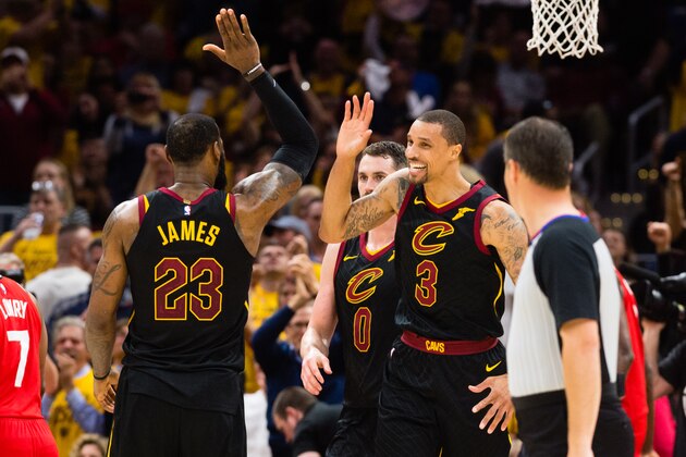 CLEVELAND, OH - MAY 7: LeBron James #23 of the Cleveland Cavaliers celebrates with George Hill #3 after Hill scored during the second half of Game 4 of the second round of the Eastern Conference playoffs against the Toronto Raptors at Quicken Loans Arena on May 7, 2018 in Cleveland, Ohio. The Cavaliers defeated the Raptors 128-93. NOTE TO USER: User expressly acknowledges and agrees that, by downloading and or using this photograph, User is consenting to the terms and conditions of the Getty Images License Agreement. (Photo by Jason Miller/Getty Images)