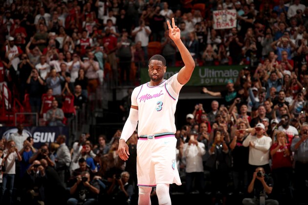 MIAMI, FL - FEBRUARY 9:  Dwyane Wade #3 of the Miami Heat addresses the crowd before the game against the Milwaukee Bucks on February 9, 2018 at American Airlines Arena in Miami, Florida. NOTE TO USER: User expressly acknowledges and agrees that, by downloading and or using this photograph, user is consenting to the terms and conditions of the Getty Images License Agreement. Mandatory Copyright Notice: Copyright 2018 NBAE (Photo by Issac Baldizon/NBAE via Getty Images)