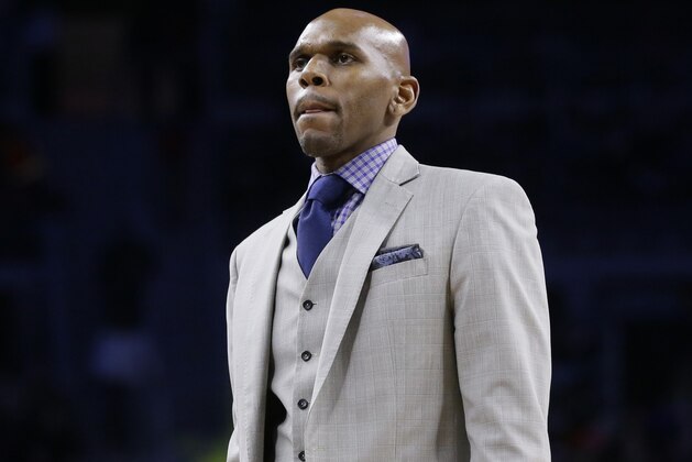 Toronto Raptors assistant coach Jerry Stackhouse is seen during the second half of an NBA basketball game against the Detroit Pistons, Sunday, Feb. 28, 2016, in Auburn Hills, Mich. (AP Photo/Carlos Osorio)