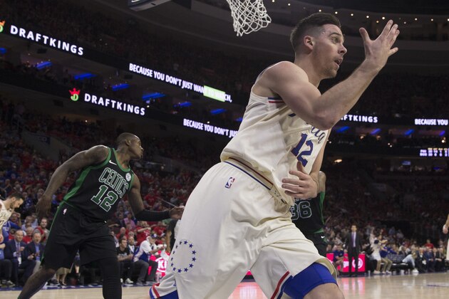 PHILADELPHIA, PA - MAY 7: T.J. McConnell #12 of the Philadelphia 76ers reacts in front of Terry Rozier #12 of the Boston Celtics after making a lay up in the third quarter during Game Four of the Eastern Conference Second Round of the 2018 NBA Playoffs at Wells Fargo Center on May 7, 2018 in Philadelphia, Pennsylvania. The 76ers defeated the Celtics 103-92. NOTE TO USER: User expressly acknowledges and agrees that, by downloading and or using this photograph, User is consenting to the terms and conditions of the Getty Images License Agreement. (Photo by Mitchell Leff/Getty Images)