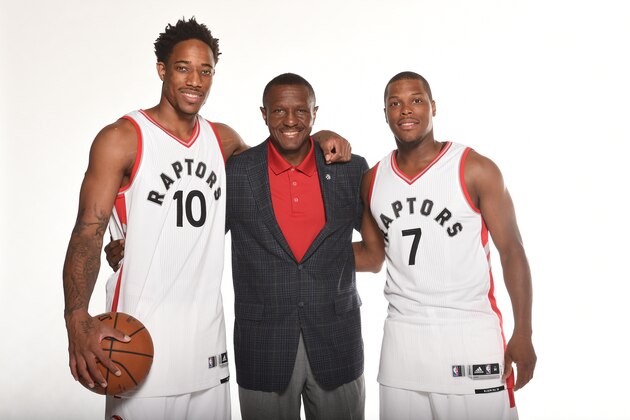 TORONTO, CANADA -  SEPTEMBER 28:  DeMar DeRozan #10, Head Coach Dwane Casey and Kyle Lowry #7 of the Toronto Raptors pose for a portrait during 2016 Media Day on September 28, 2016 at the BioSteel Centre in Toronto, Ontario, Canada.  NOTE TO USER: User expressly acknowledges and agrees that, by downloading and or using this Photograph, user is consenting to the terms and conditions of the Getty Images License Agreement.  Mandatory Copyright Notice: Copyright 2016 NBAE (Photo by Ron Turenne/NBAE via Getty Images)