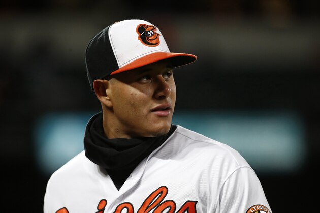 Baltimore Orioles' Manny Machado walks off the field between innings of a baseball game against the Toronto Blue Jays, Tuesday, April 10, 2018, in Baltimore. (AP Photo/Patrick Semansky)