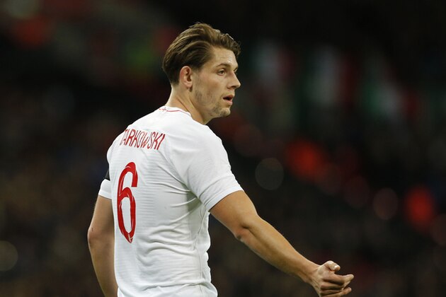 England's James Tarkowski reacts to teammates during the friendly soccer match between England and Italy at Wembley stadium London, Tuesday, March, 27, 2018. (AP Photo/Alastair Grant)