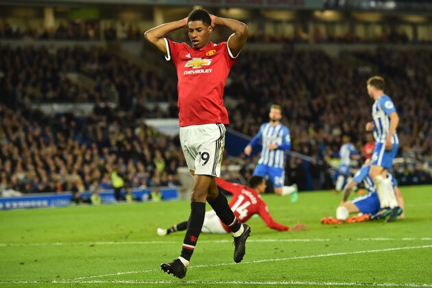 Manchester United's English striker Marcus Rashford reacts after another chance is missed during the English Premier League football match between Brighton and Hove Albion and Manchester United at the American Express Community Stadium in Brighton, southern England on May 4, 2018. (Photo by Glyn KIRK / AFP) / RESTRICTED TO EDITORIAL USE. No use with unauthorized audio, video, data, fixture lists, club/league logos or 'live' services. Online in-match use limited to 75 images, no video emulation. No use in betting, games or single club/league/player publications. /         (Photo credit should read GLYN KIRK/AFP/Getty Images)