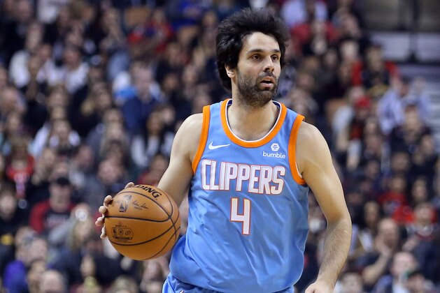 TORONTO, ON - MARCH 25:  Milos Teodosic #4 of the Los Angeles Clippers dribbles the ball the first half of an NBA game against the Toronto Raptors at Air Canada Centre on March 25, 2018 in Toronto, Canada.  NOTE TO USER: User expressly acknowledges and agrees that, by downloading and or using this photograph, User is consenting to the terms and conditions of the Getty Images License Agreement.  (Photo by Vaughn Ridley/Getty Images)