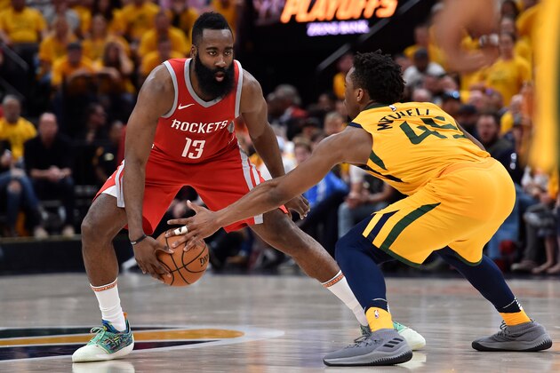SALT LAKE CITY, UT - MAY 06: Donovan Mitchell #45 of the Utah Jazz knocks the ball from the hands of James Harden #13 of the Houston Rockets in the second half during Game Four of Round Two of the 2018 NBA Playoffs at Vivint Smart Home Arena on May 6, 2018 in Salt Lake City, Utah. The Rockets beat the Jazz 100-87. NOTE TO USER: User expressly acknowledges and agrees that, by downloading and or using this photograph, User is consenting to the terms and conditions of the Getty Images License Agreement. (Photo by Gene Sweeney Jr./Getty Images)