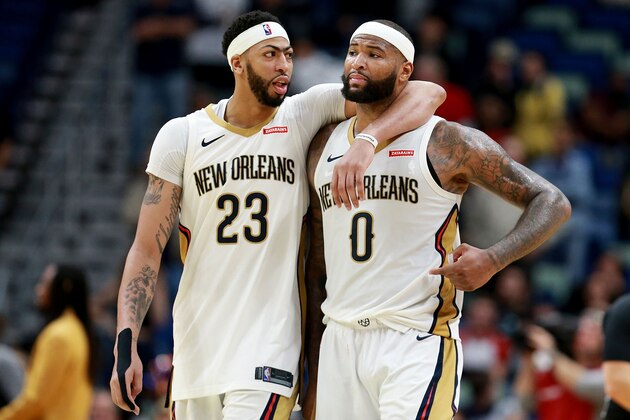 NEW ORLEANS, LA - JANUARY 22:  Anthony Davis #23 of the New Orleans Pelicans and DeMarcus Cousins #0 of the New Orleans Pelicans walk of the court during a NBA game against the Chicago Bulls at the Smoothie King Center on January 22, 2018 in New Orleans, Louisiana. NOTE TO USER: User expressly acknowledges and agrees that, by downloading and or using this photograph, User is consenting to the terms and conditions of the Getty Images License Agreement.  (Photo by Sean Gardner/Getty Images)
