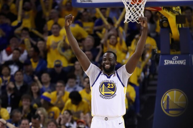 OAKLAND, CA - MAY 08:  Draymond Green #23 of the Golden State Warriors reacts after the Warriors made a basket against the New Orleans Pelicans during Game Five of the Western Conference Semifinals of the 2018 NBA Playoffs at ORACLE Arena on May 8, 2018 in Oakland, California.  NOTE TO USER: User expressly acknowledges and agrees that, by downloading and or using this photograph, User is consenting to the terms and conditions of the Getty Images License Agreement.  (Photo by Ezra Shaw/Getty Images)