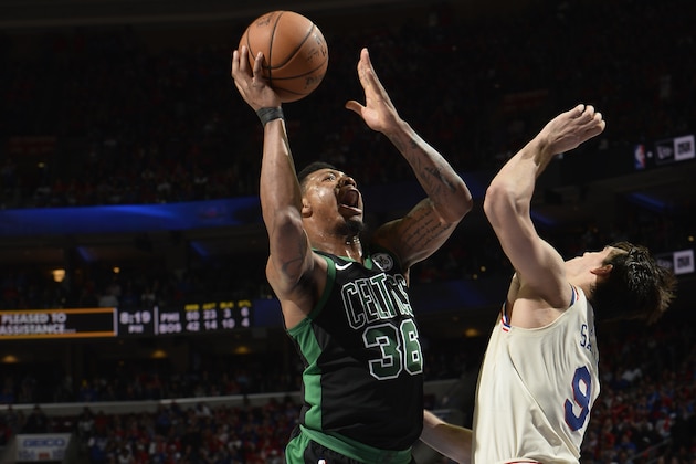 PHILADELPHIA, PA - MAY 7: Marcus Smart #36 of the Boston Celtics shoots the ball against the Philadelphia 76ers in Game Four of the Eastern Conference Semifinals during the 2018 NBA Playoffs on May 7, 2018 at Wells Fargo Center in Philadelphia, Pennsylvania. NOTE TO USER: User expressly acknowledges and agrees that, by downloading and/or using this photograph, user is consenting to the terms and conditions of the Getty Images License Agreement. Mandatory Copyright Notice: Copyright 2018 NBAE (Photo by David Dow/NBAE via Getty Images)