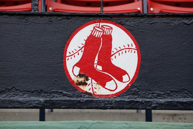 A slightly rusted Boston Red Sox logo is seen at Fenway Park in Boston, Monday, Oct. 5, 2015, a day after the Red Sox finished the baseball season in last place in the American League East. (AP Photo/Michael Dwyer)