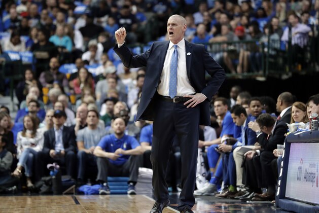 Dallas Mavericks head coach Rick Carlisle instructs his team during a NBA basketball game against the Phoenix Suns in Dallas, Tuesday, April 10, 2018. (AP Photo/Tony Gutierrez)