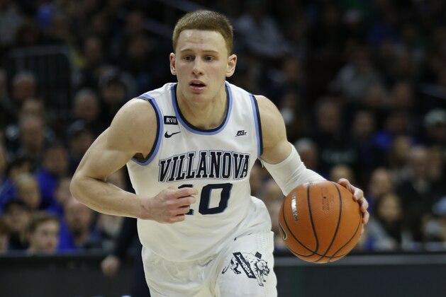 Villanova guard Donte DiVincenzo (10) in action during an NCAA college basketball game against Seton Hall, Sunday, Feb. 4, 2018, in Philadelphia. Villanova won 92-76. (AP Photo/Laurence Kesterson)